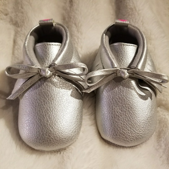 silver baby shoes